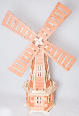 Garden windmills: A decorative wooden windmill rotating in the wind, creating a picturesque and tranquil scene in the outdoor landscape.