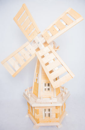 Handcrafted wooden windmills in various designs - charming garden decor with a touch of rustic elegance. Pendle Windmills